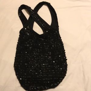 Black blinged out Shell Rule 21 hobo bag😊